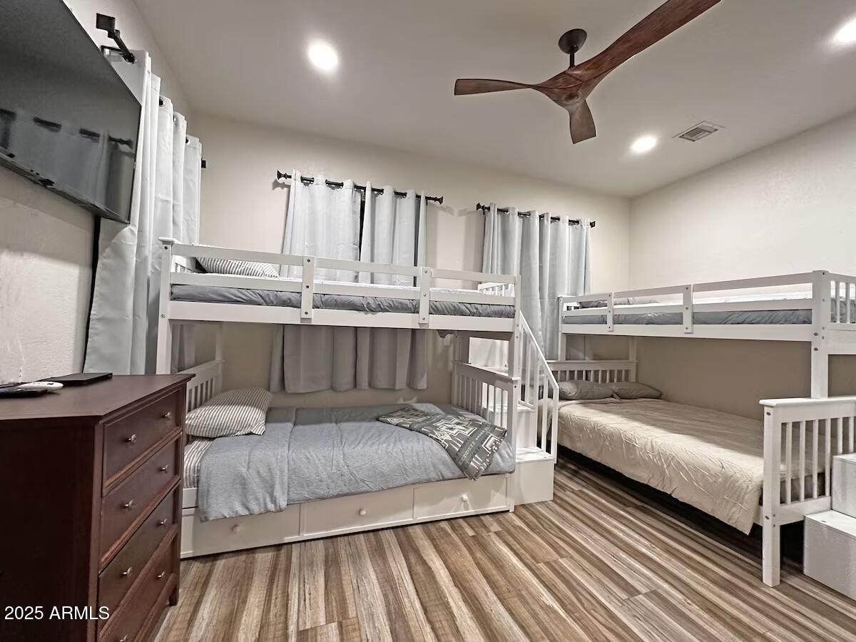 9755 Dike Road Mohave Valley, AZ 86440 - Photo 29 of 50 a bedroom with a bed window and a table