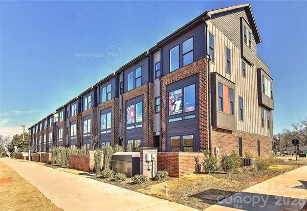 a front view of a building with street view