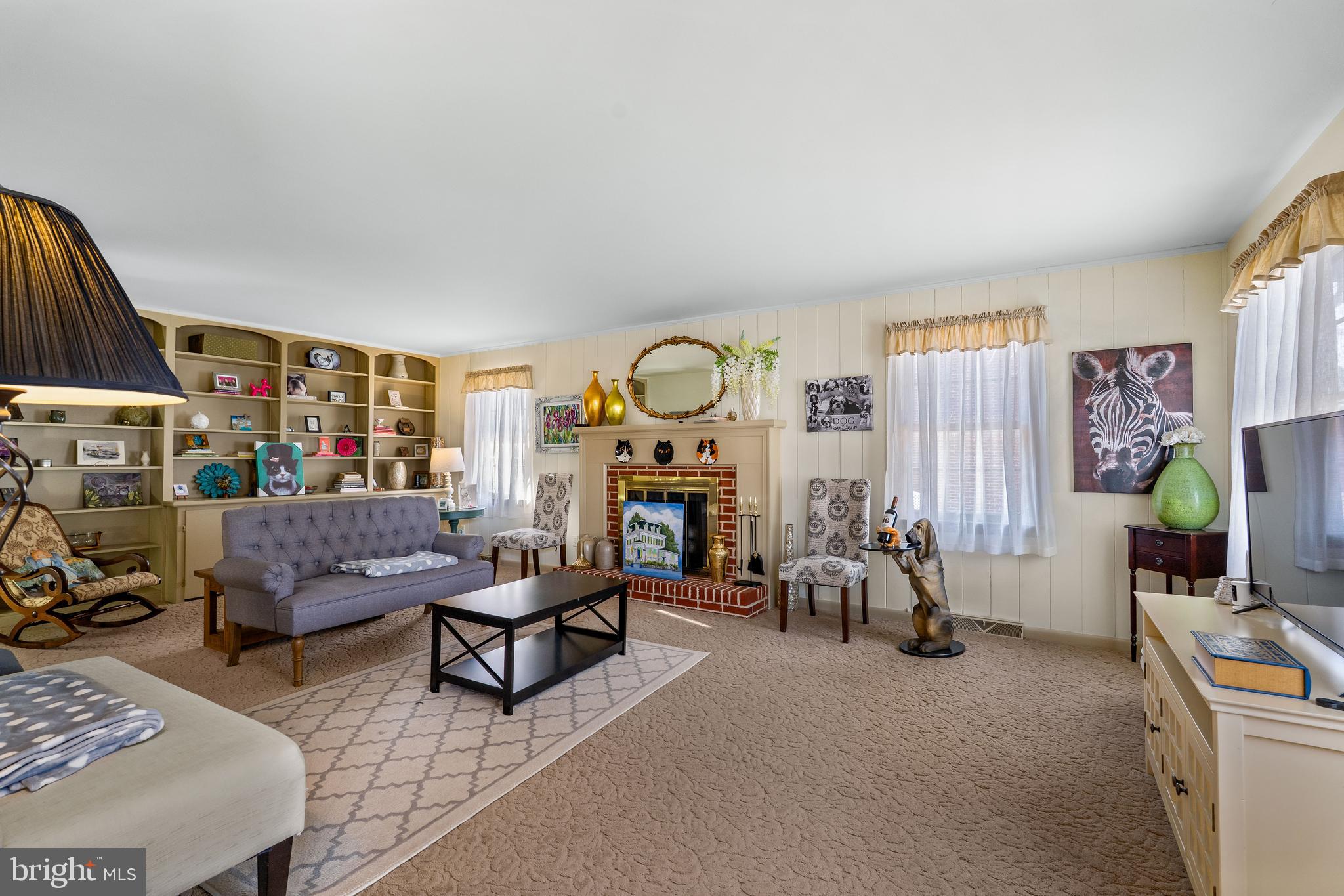 Very large family room with wood burning FP.