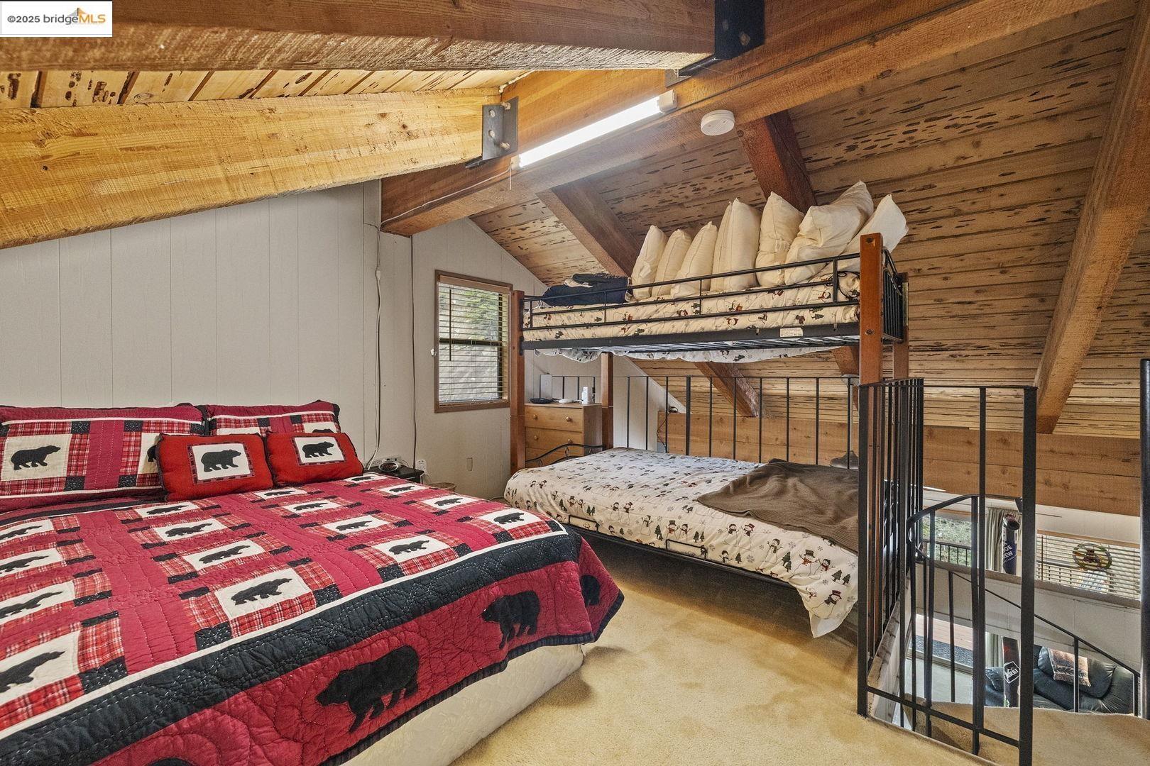 33781 Upper Leland Road, Unit A Pinecrest, CA 95364 - Photo 16 of 33 a bedroom with two beds and window