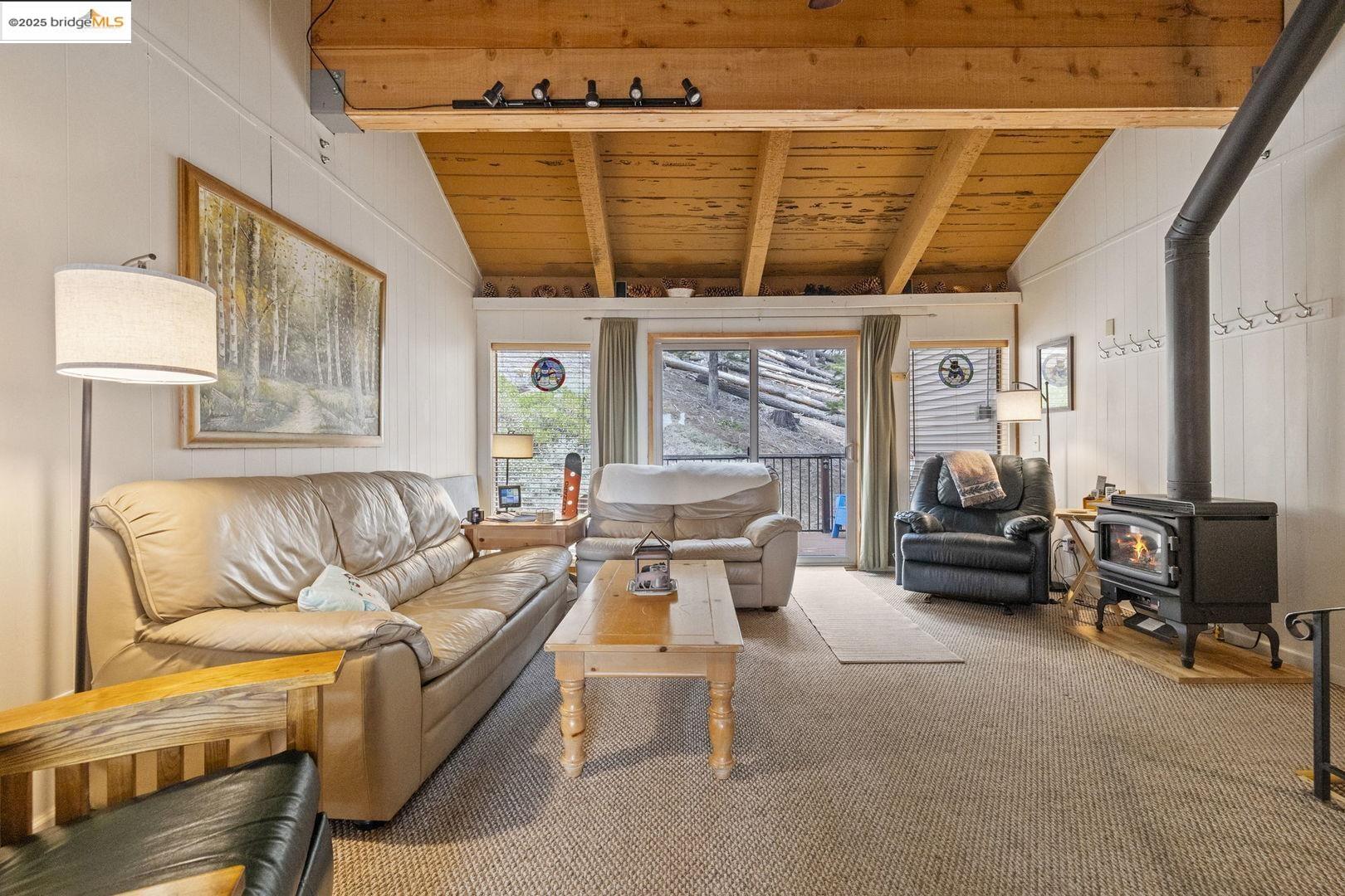 33781 Upper Leland Road, Unit A Pinecrest, CA 95364 - Photo 18 of 33 a living room with furniture and a large window