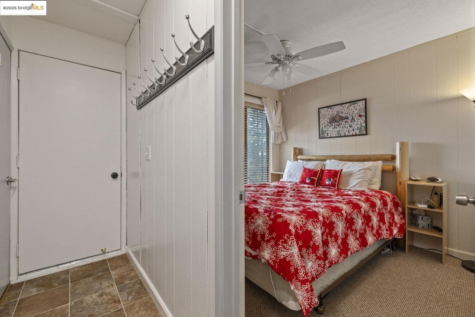 33781 Upper Leland Road, Unit A Pinecrest, CA 95364 - Photo 20 of 33 a bedroom with a bed and a window