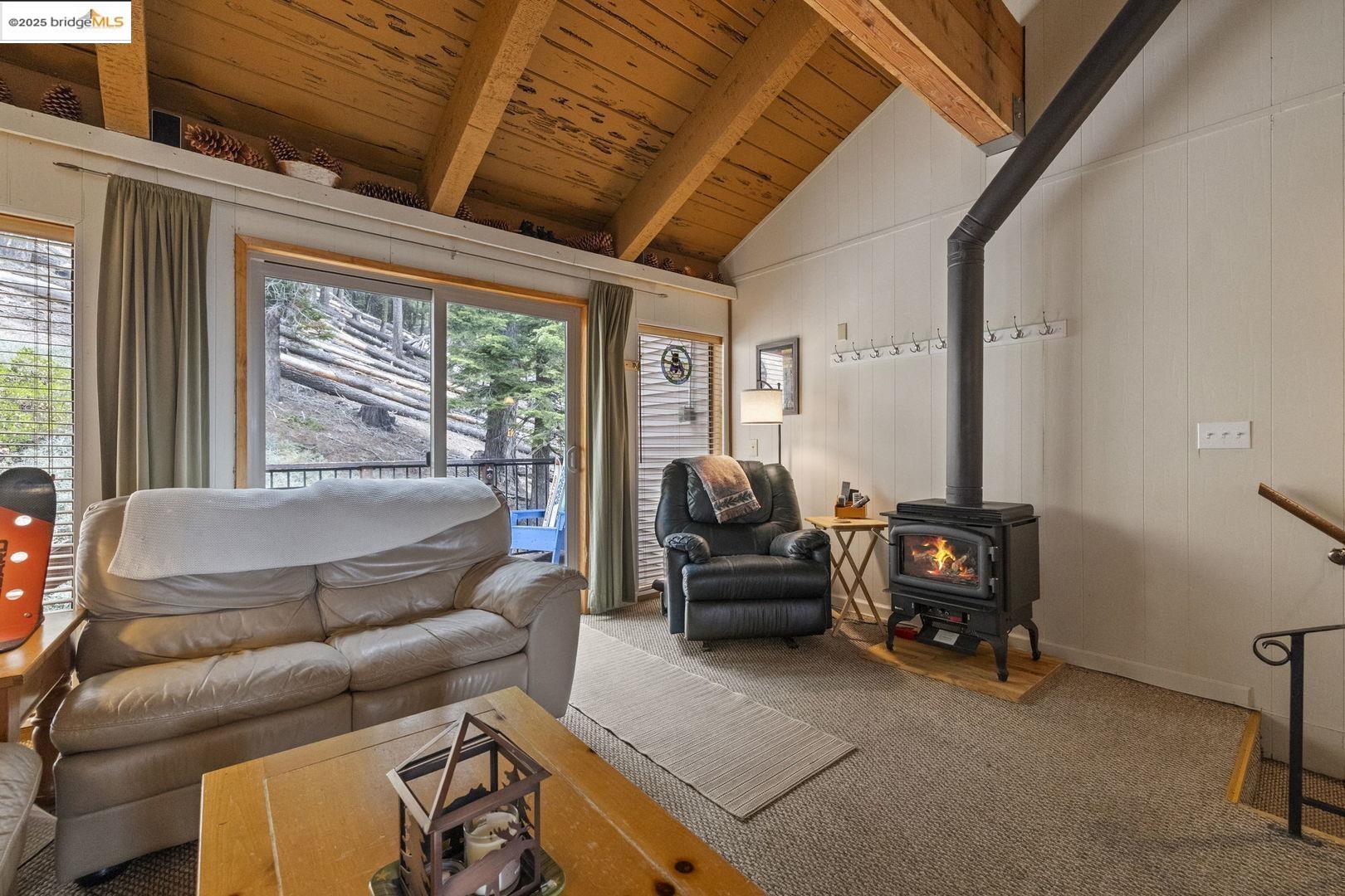 33781 Upper Leland Road, Unit A Pinecrest, CA 95364 - Photo 6 of 33 a living room with furniture and a flat screen tv