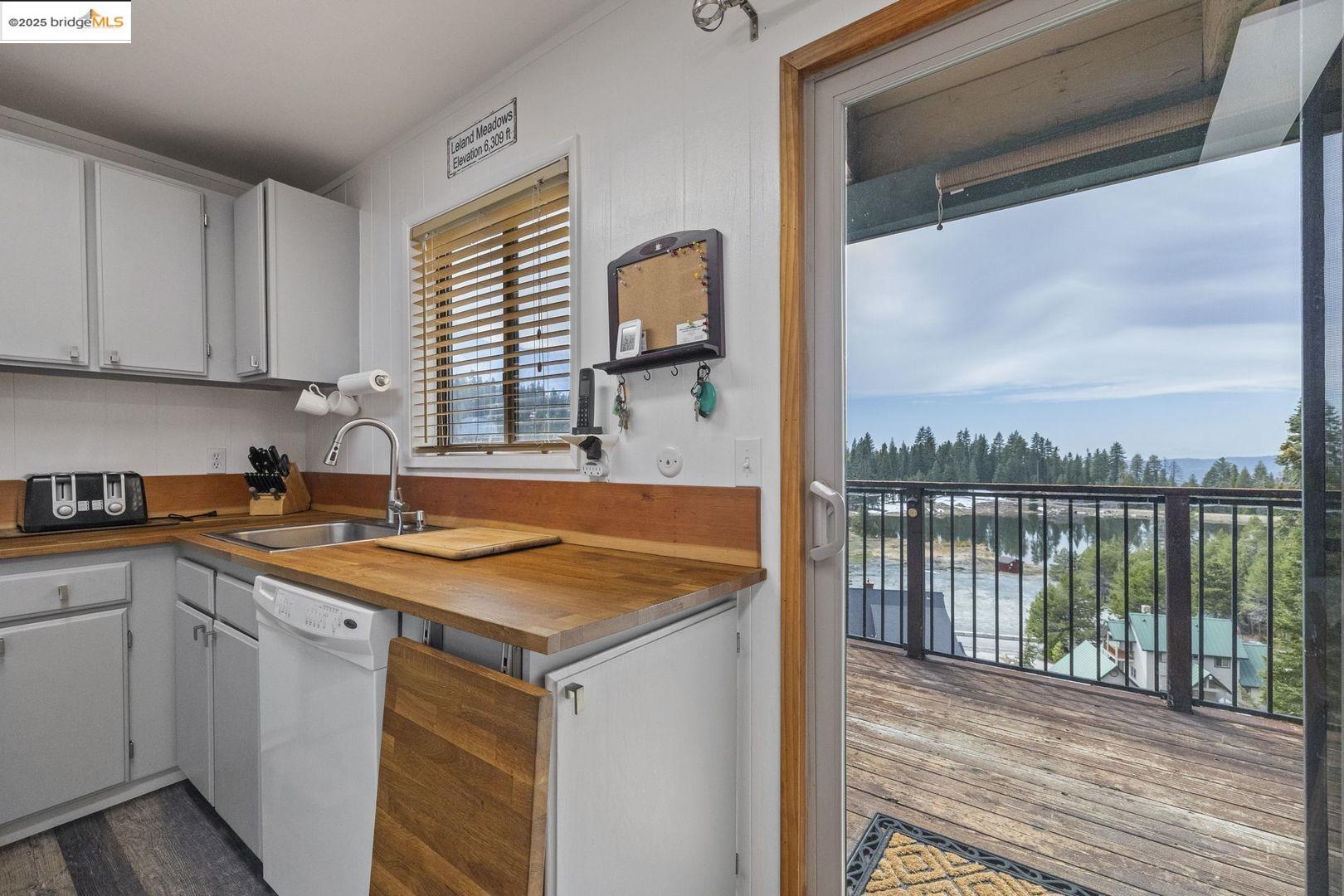 33781 Upper Leland Road, Unit A Pinecrest, CA 95364 - Photo 10 of 33 a kitchen with a sink and a window