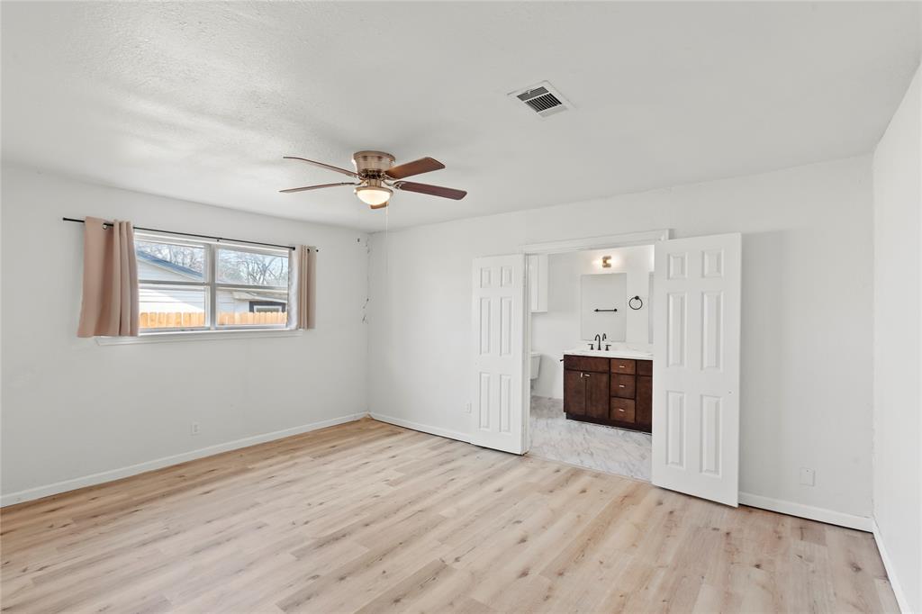 1012 East Dallas Street Mansfield, TX 76063 - Photo 12 of 25 a view of an empty room with a window
