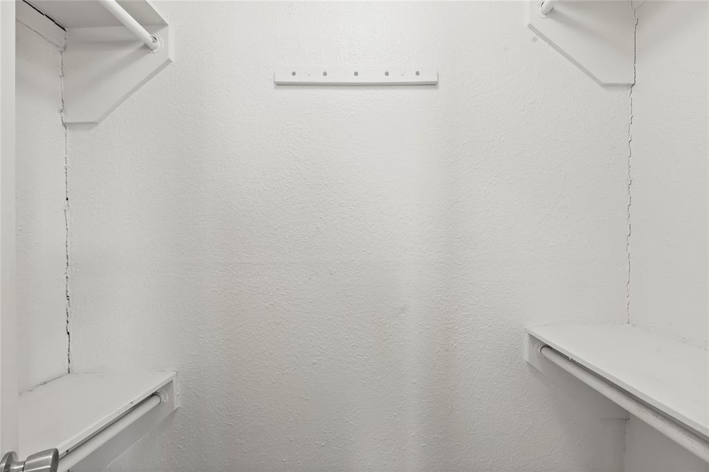 1012 East Dallas Street Mansfield, TX 76063 - Photo 16 of 25 a view of a room with racks on the wall