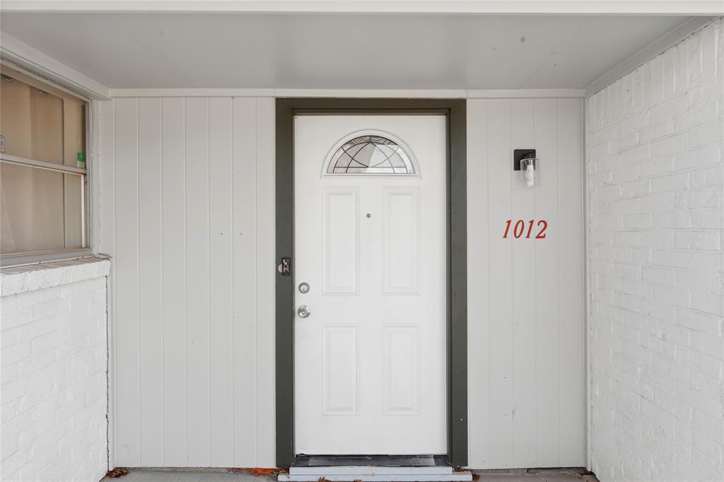 1012 East Dallas Street Mansfield, TX 76063 - Photo 3 of 25 a view of front door with wooden floor