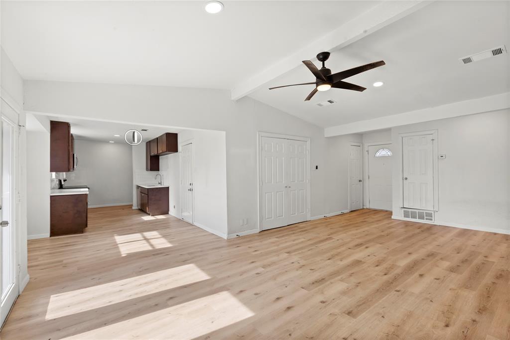 1012 East Dallas Street Mansfield, TX 76063 - Photo 7 of 25 a view of a livingroom with a ceiling fan and window