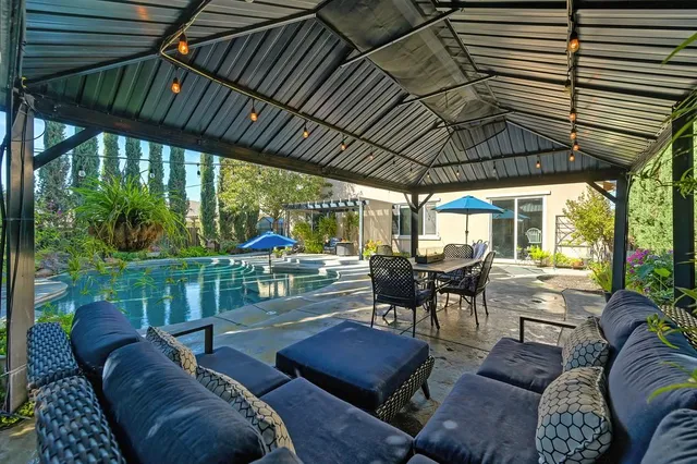 a outdoor living space with furniture and garden view
