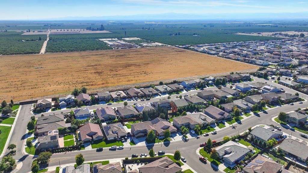 806 Mono Street Manteca, CA 95337 - Photo 37 of 38 an aerial view of residential houses with outdoor space