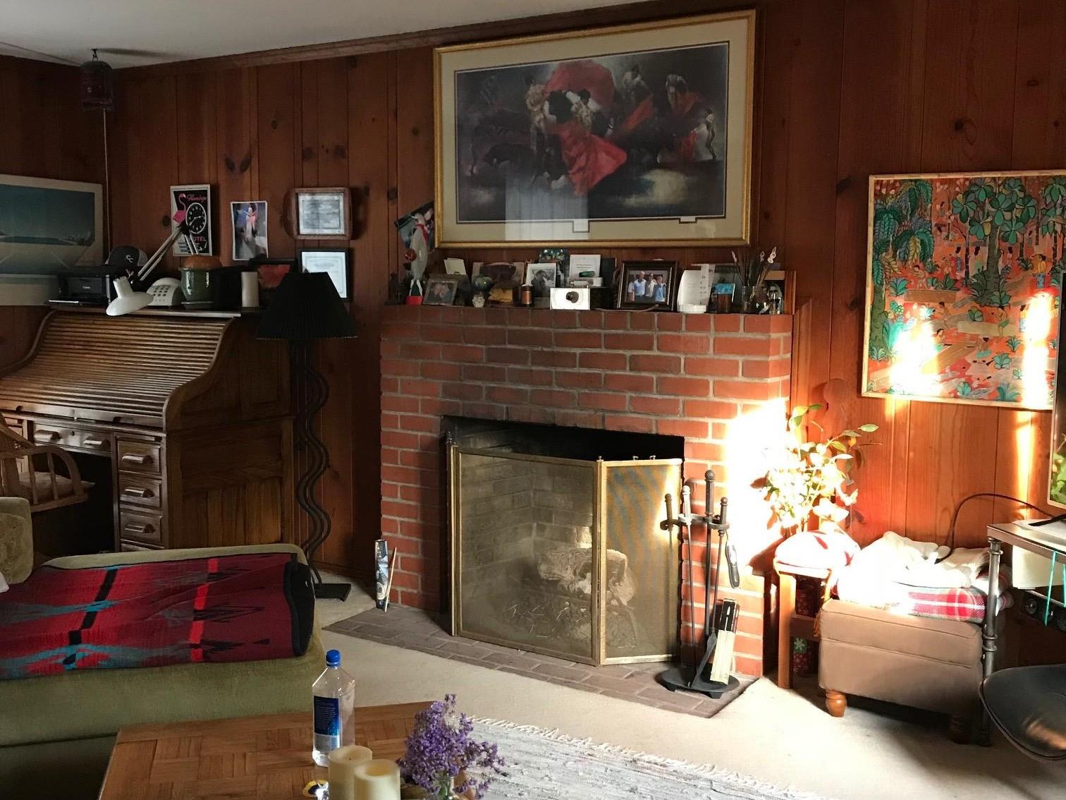 2511 Medcliff Road Santa Barbara, CA 93109 - Photo 6 of 8 a living room with furniture a flat screen tv and a fireplace