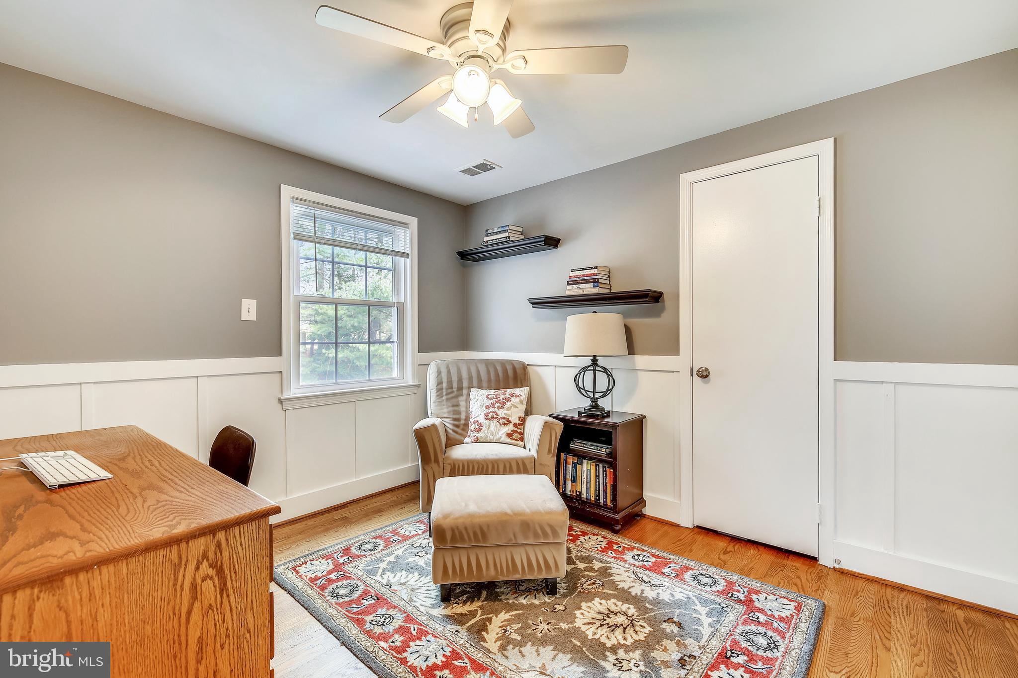 8801 Cold Spring Road Potomac, MD 20854 - Photo 31 of 44 a living room with furniture and a window