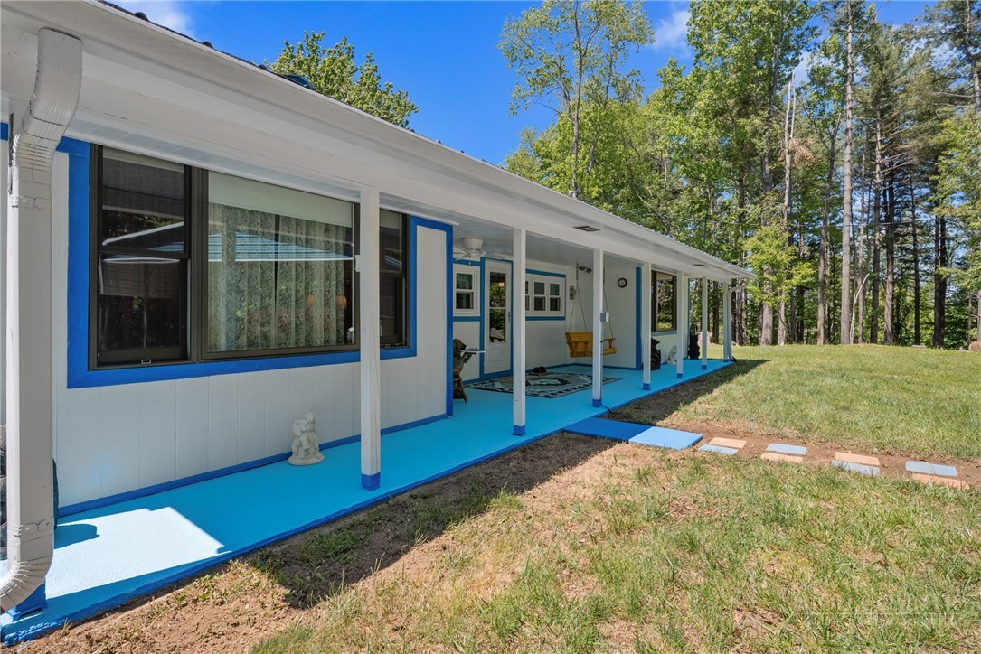154 Folger Road Sparta, NC 28675 - Photo 25 of 37 a view of a house with a backyard