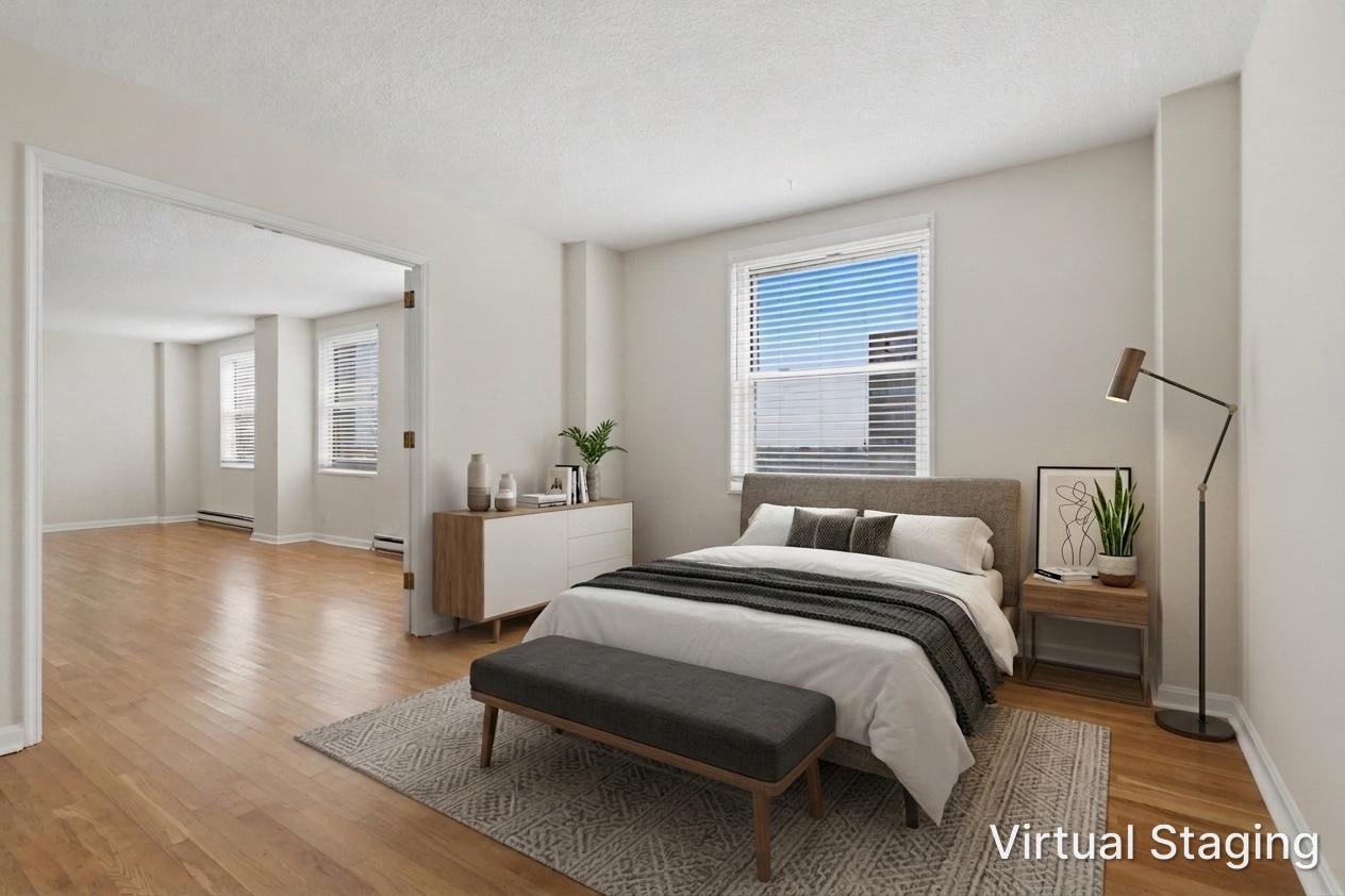 1101 St Paul Street, Unit 1212 Baltimore, MD 21202 - Photo 25 of 36 Bedroom 2 with virtual staging.