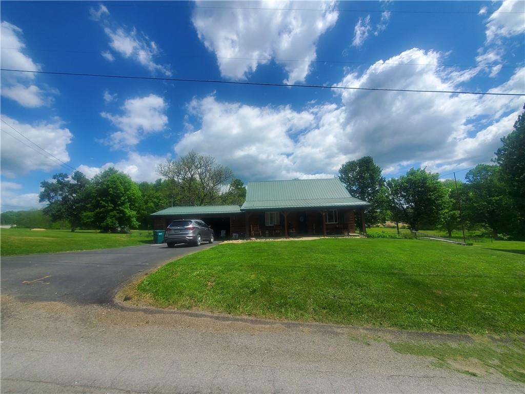 132 Laird's Crossing Road Worthington, PA 16262 - Photo 6 of 20 a view of a backyard with green space