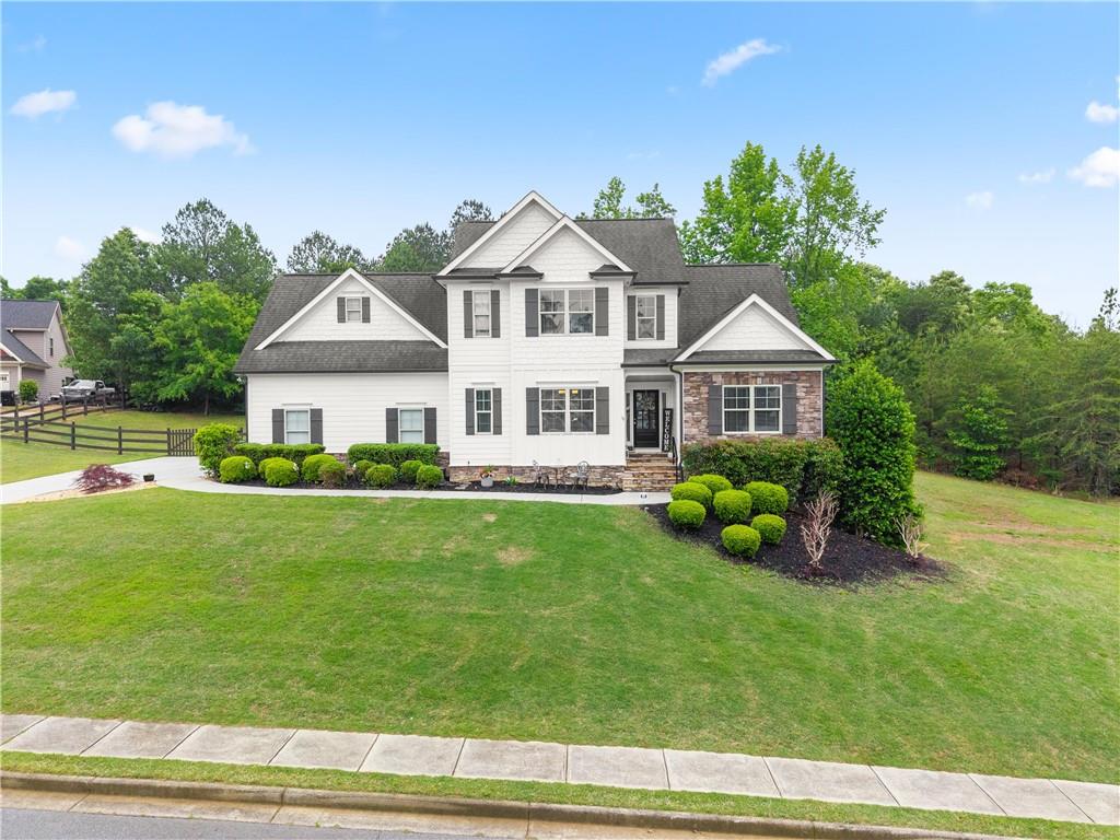10 Coppage Lane Cartersville, GA 30120 - Photo 2 of 51 a front view of a house with garden