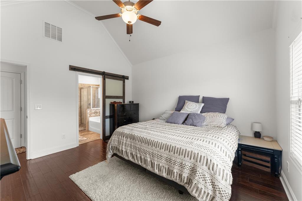 10 Coppage Lane Cartersville, GA 30120 - Photo 21 of 51 a bedroom with a bed and wooden floor
