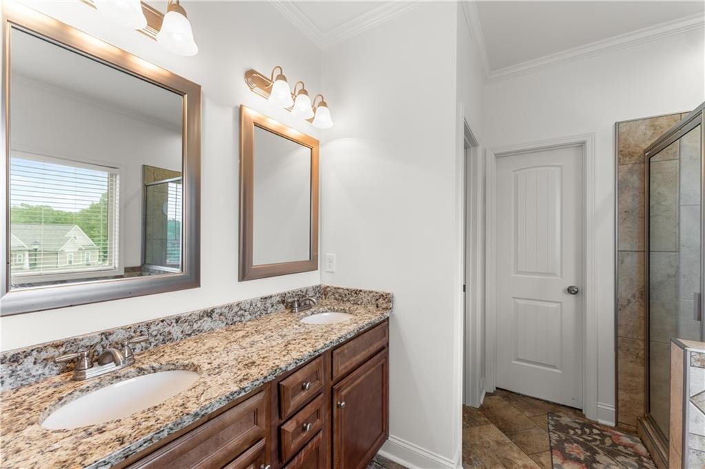 10 Coppage Lane Cartersville, GA 30120 - Photo 23 of 51 a bathroom with a granite countertop sink and a mirror