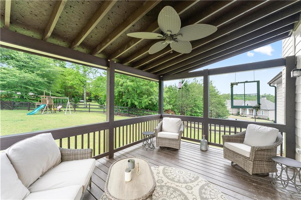 10 Coppage Lane Cartersville, GA 30120 - Photo 38 of 51 a view of a porch with furniture and wooden floor
