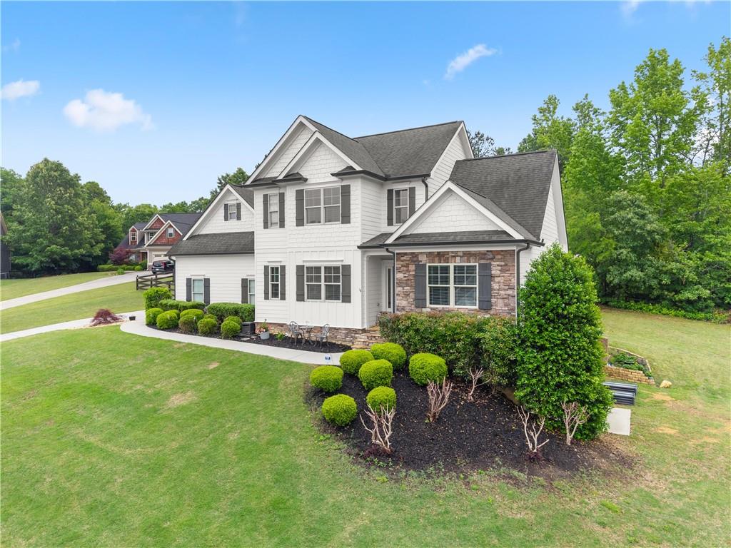 10 Coppage Lane Cartersville, GA 30120 - Photo 4 of 51 a front view of a house with a garden