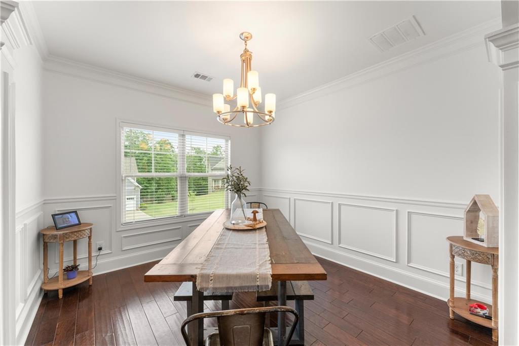 10 Coppage Lane Cartersville, GA 30120 - Photo 8 of 51 a view of a dining room with furniture window and wooden floor