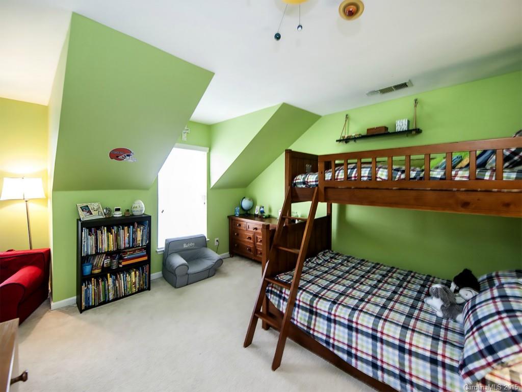 6509 Elfreda Road Charlotte, NC 28270 - Photo 14 of 19 a bedroom with a bed and a window