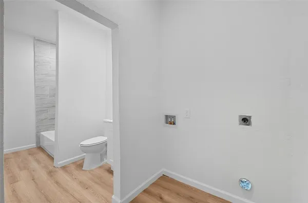 a view of bathroom with a sink and a toilet