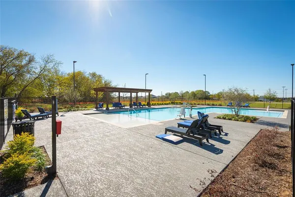 a view of a building with backyard