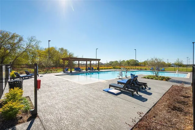 a view of a building with backyard