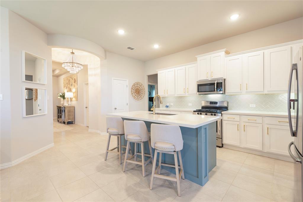 1229 Sunbeam Cove Anna, TX 75409 - Photo 6 of 36 Such a beautiful kitchen filled with light