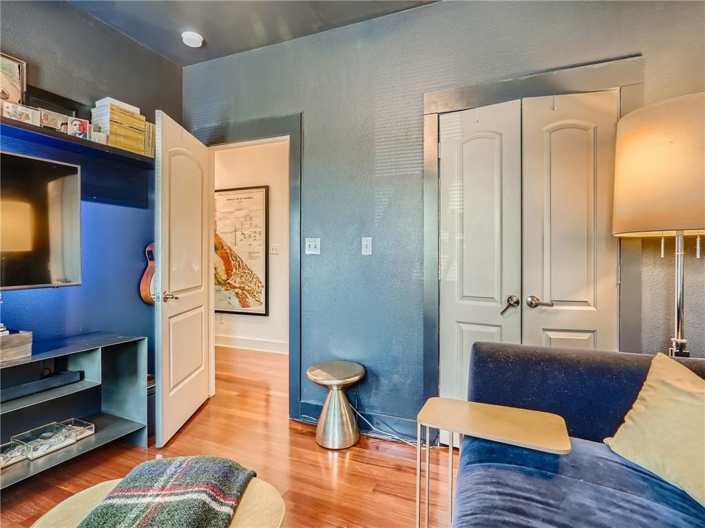 3304 East 5th Street, Unit A Austin, TX 78702 - Photo 11 of 16 a living room with furniture and wooden floor