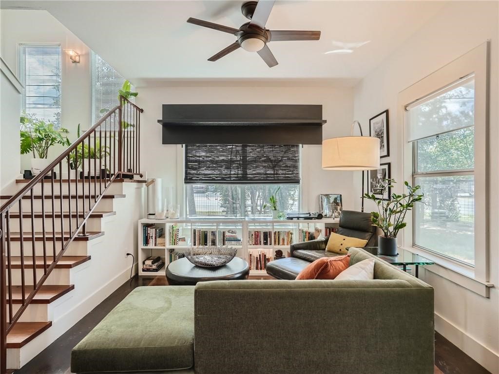 3304 East 5th Street, Unit A Austin, TX 78702 - Photo 4 of 16 a living room with furniture fireplace and a large window