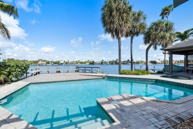 a view of a swimming pool and a terrace