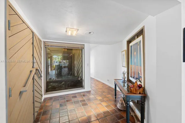 a view of an entryway with a front door