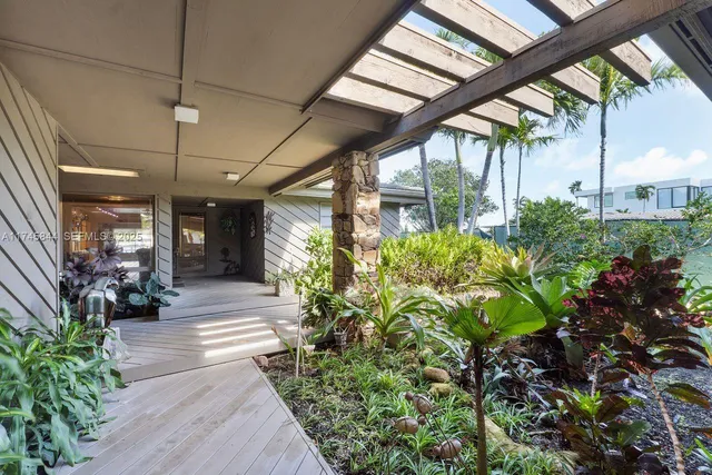 a lobby with chair and table