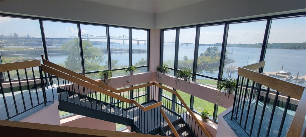 750 Davol Street, Unit 1012 Fall River, MA 02720 - Photo 15 of 29 a view of a balcony with furniture