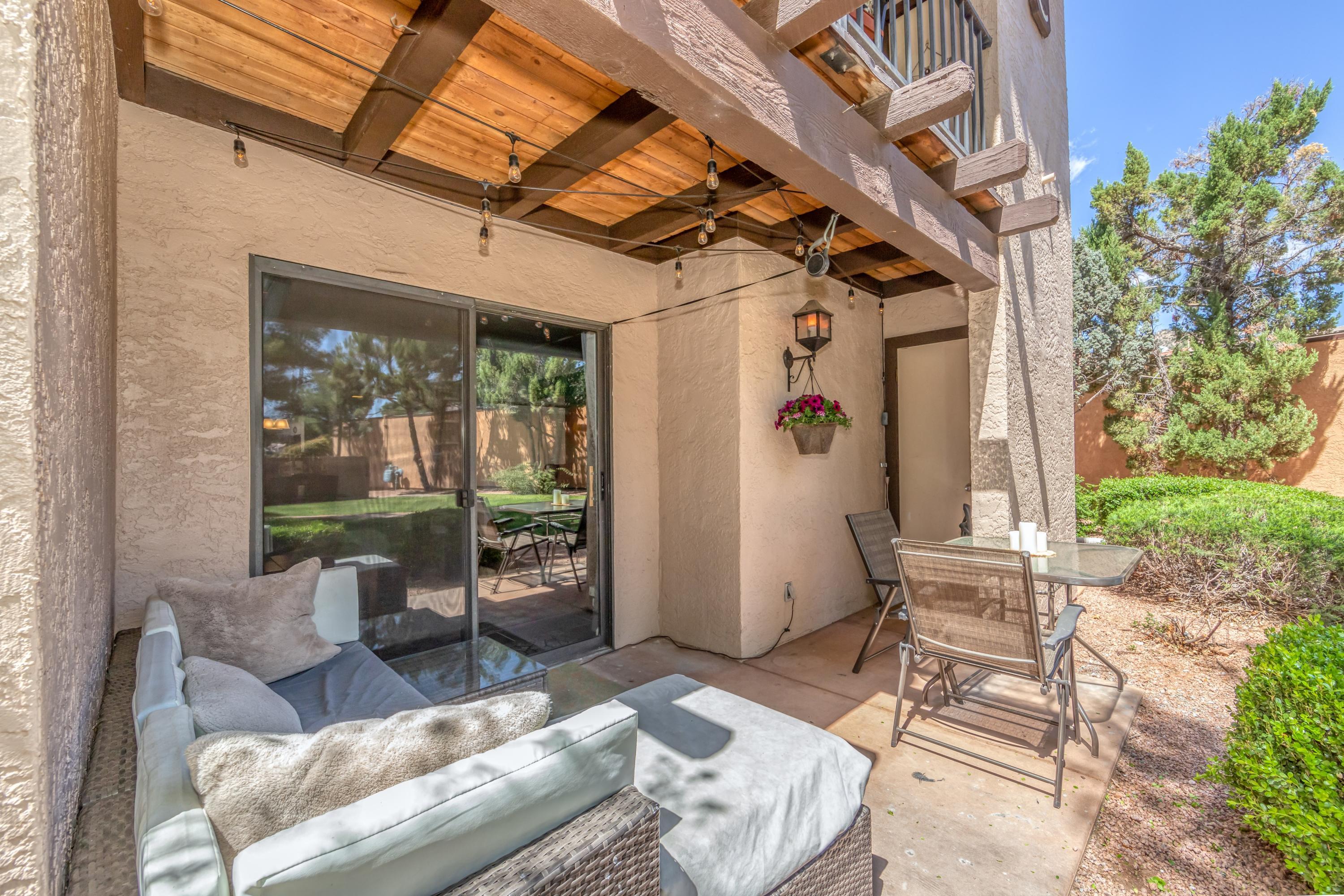 65 Verde Valley School Road, Unit C8 Sedona, AZ 86351 - Photo 20 of 26 a outdoor living space with patio furniture