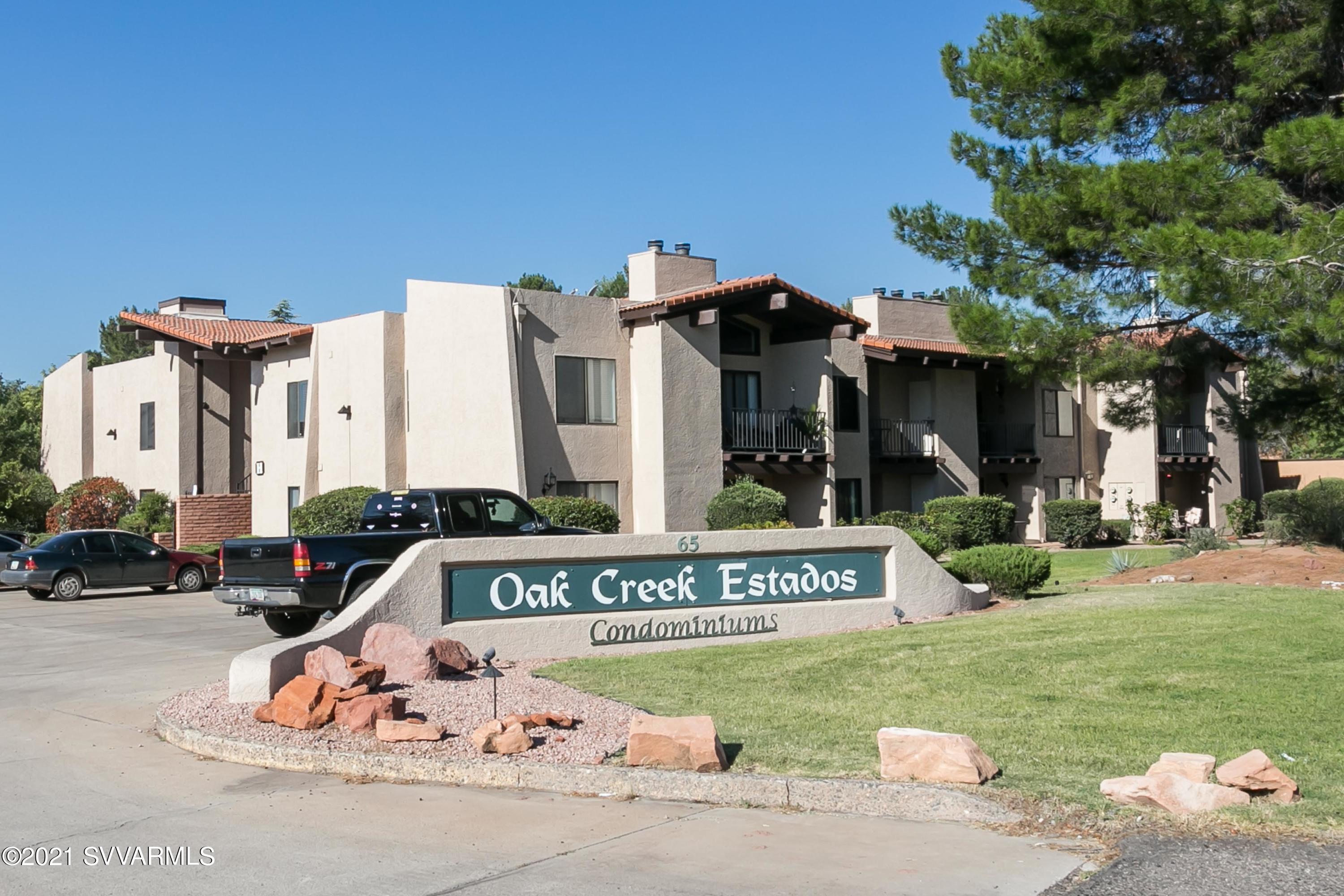 65 Verde Valley School Road, Unit C8 Sedona, AZ 86351 - Photo 21 of 26 a view of a house with outdoor space and sitting area