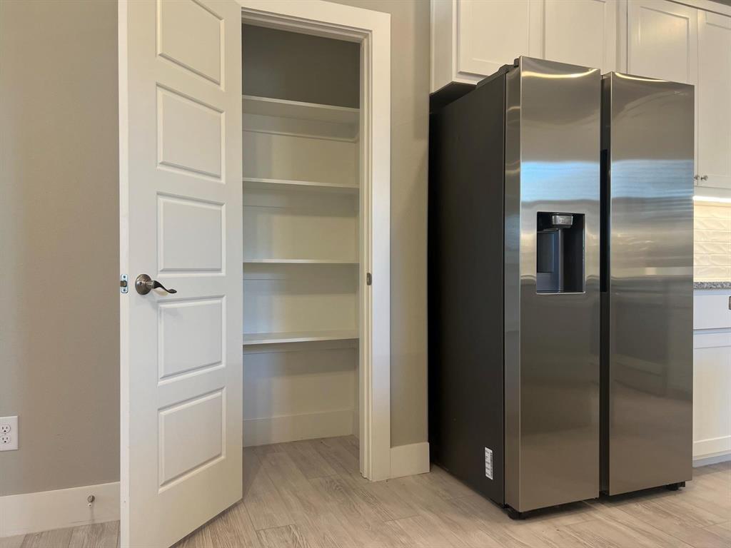 605 North Friendship Road Sherman, TX 75092 - Photo 10 of 17 a refrigerator freezer sitting inside of a kitchen