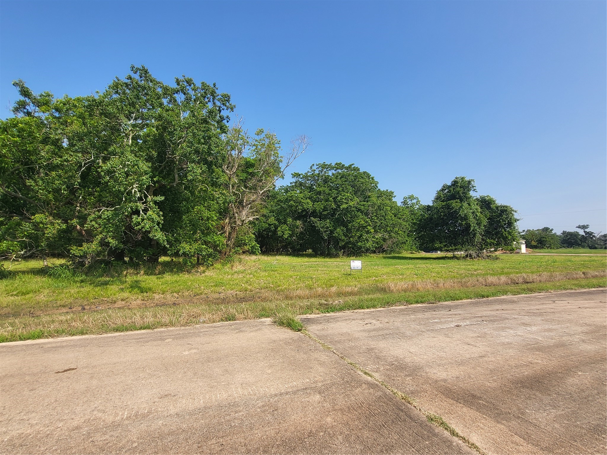 Lot 71 Conestoga Trail Angleton, TX 77515 - Photo 2 of 5 a view of a house with a big yard