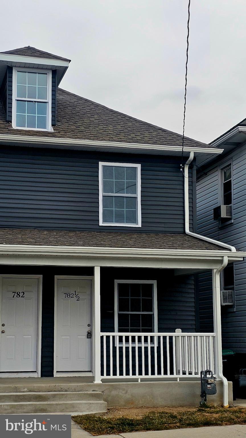 Charming duplex with modern curb appeal.