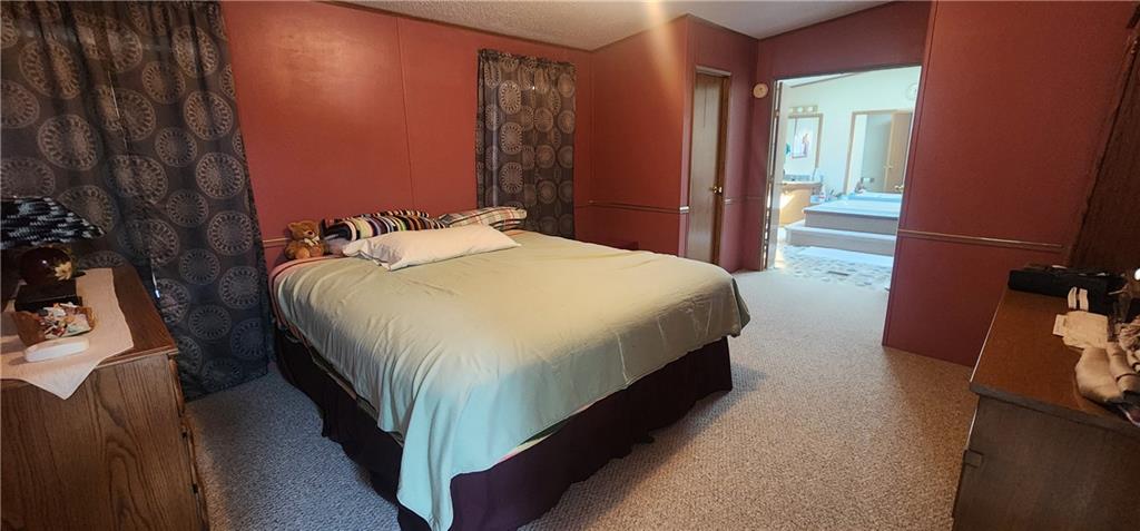 1374 Saltsburg Road Clarksburg, PA 15725 - Photo 14 of 22 a bedroom with a bed and a mirror