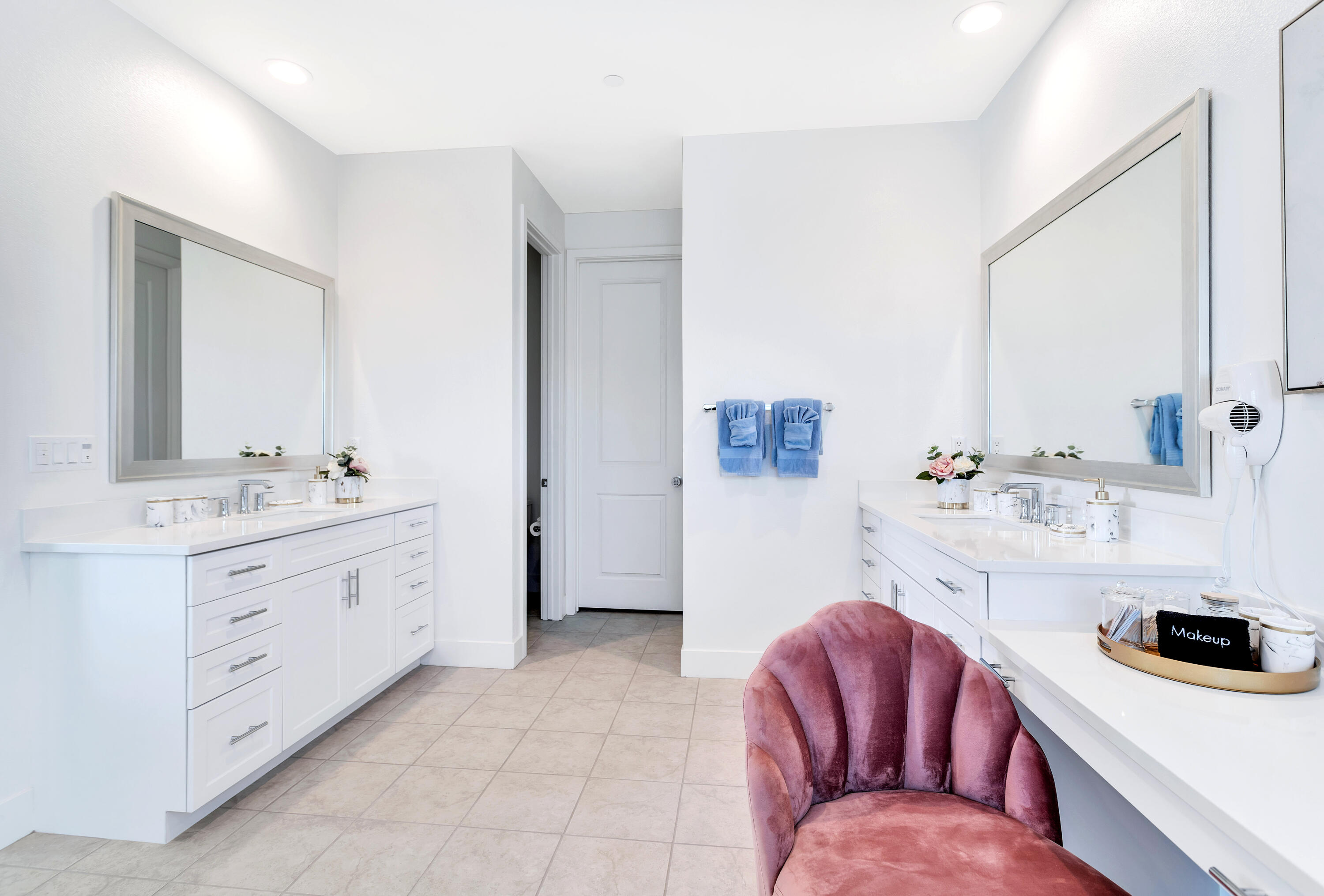 43180 Portuale Court Indio, CA 92203 - Photo 40 of 99 a bathroom with a sink double vanity and a mirror