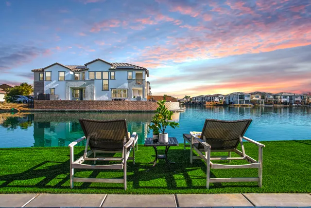 a bathroom with a sink double vanity and a mirror