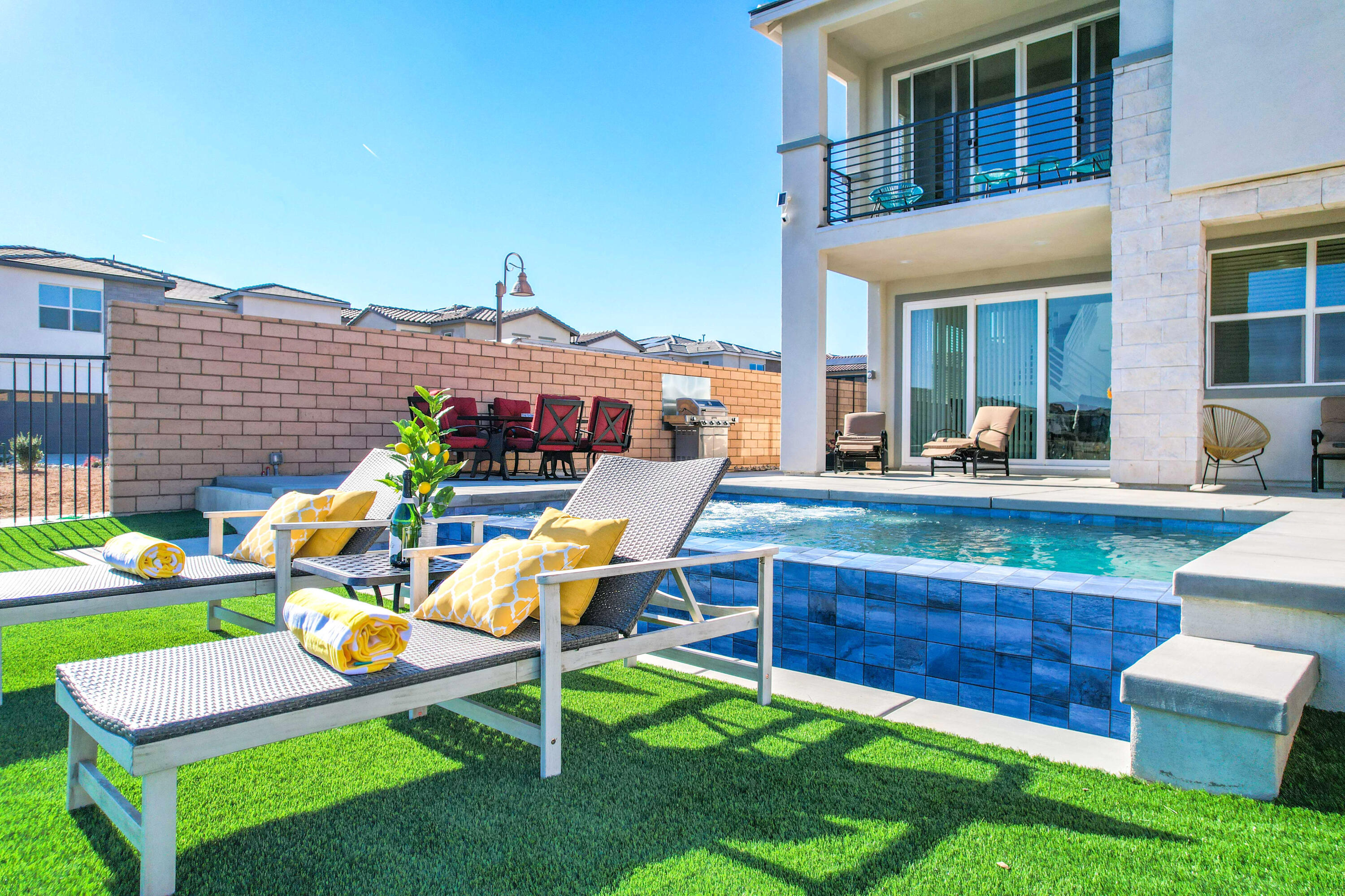 43180 Portuale Court Indio, CA 92203 - Photo 6 of 99 a view of an chairs and table in patio of the house