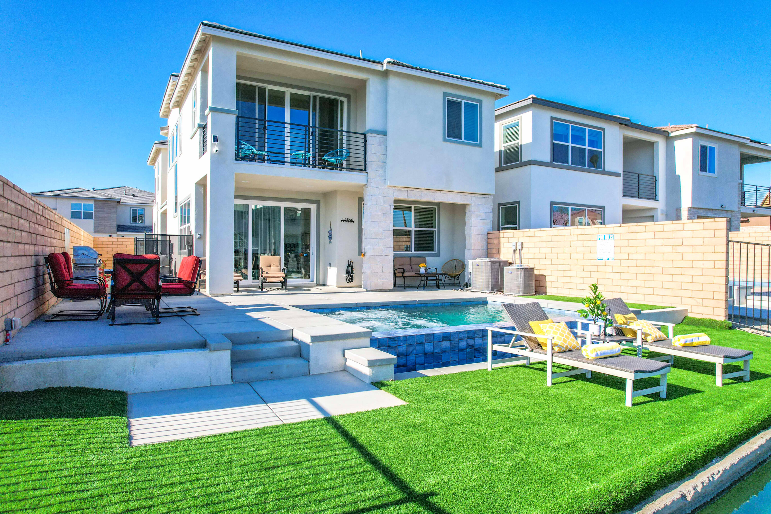43180 Portuale Court Indio, CA 92203 - Photo 63 of 99 a front view of house with yard