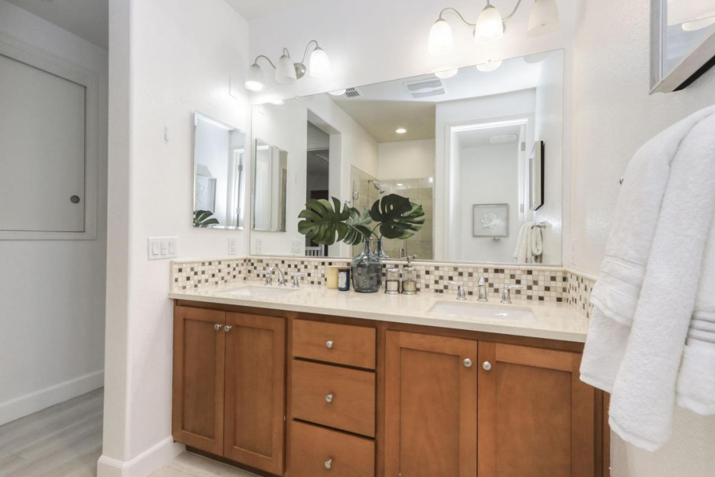 2043 Atlas Loop Mountain View, CA 94043 - Photo 13 of 42 a bathroom with a sink and a mirror