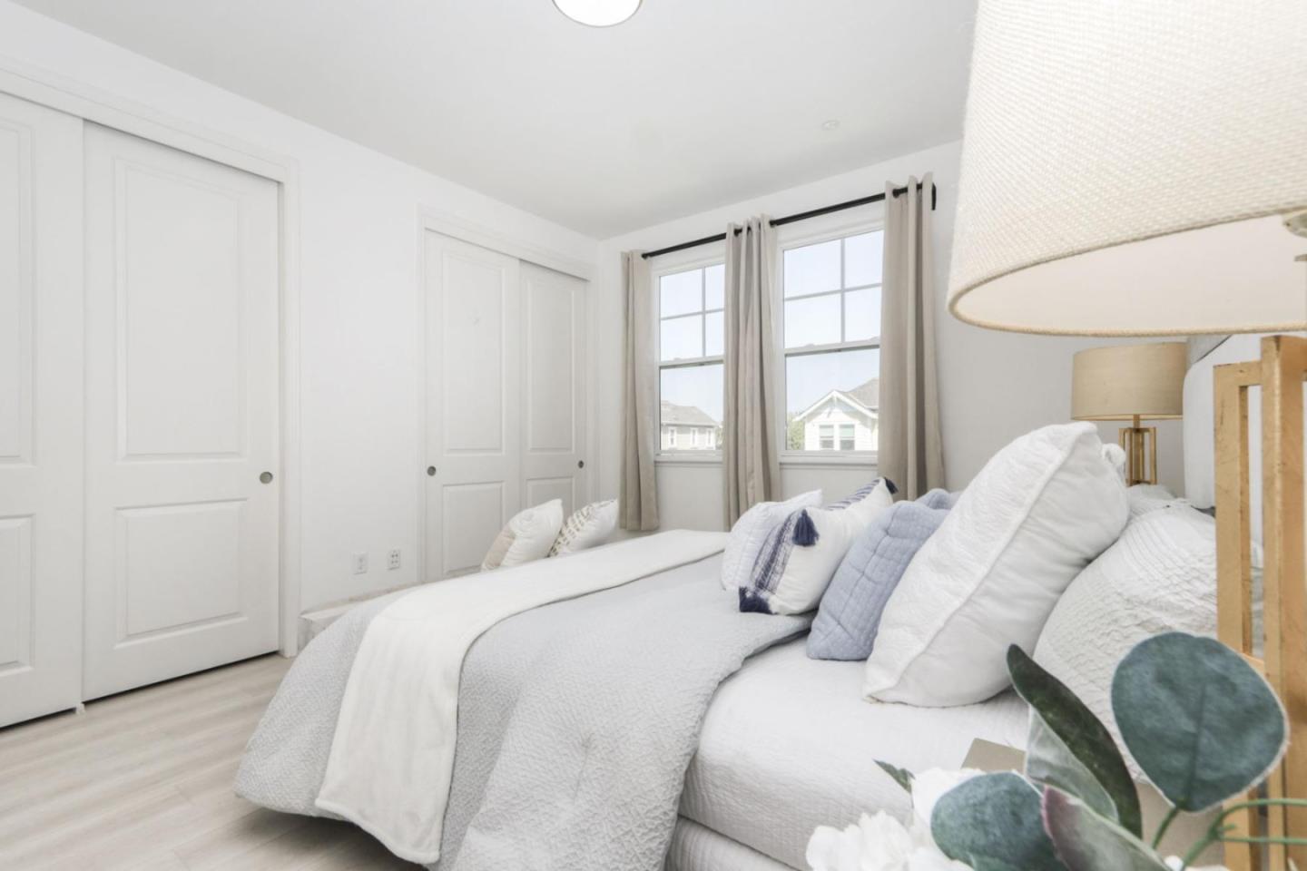 2043 Atlas Loop Mountain View, CA 94043 - Photo 15 of 42 a bedroom with a bed and a window