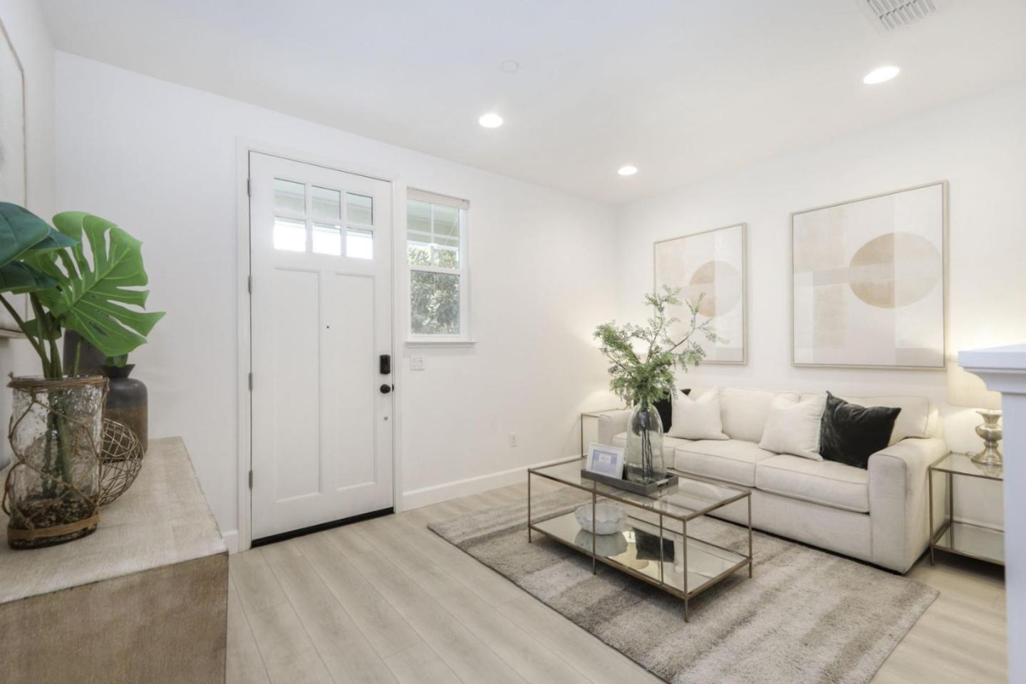 2043 Atlas Loop Mountain View, CA 94043 - Photo 26 of 42 a living room with furniture potted plant and a window