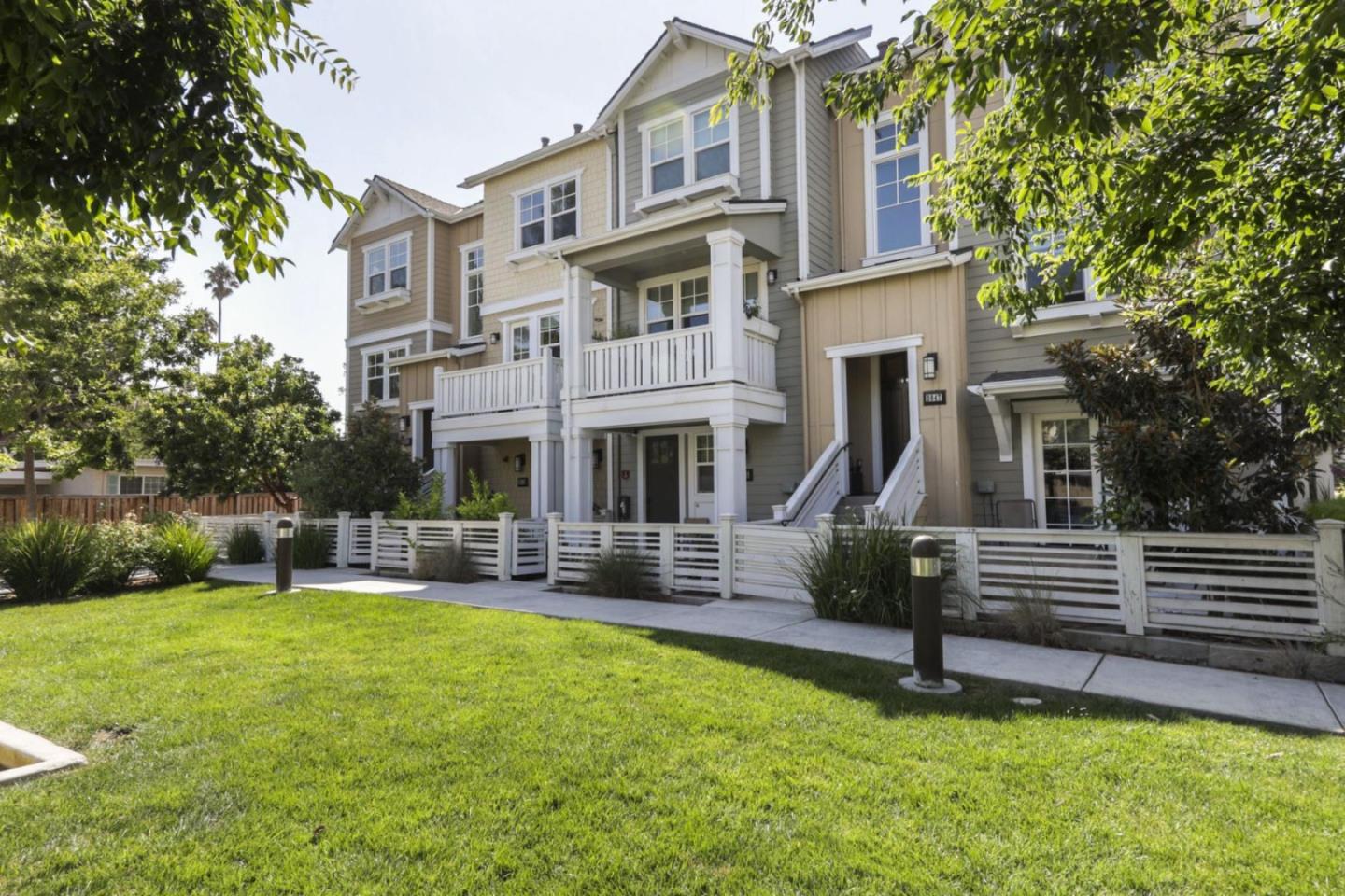 2043 Atlas Loop Mountain View, CA 94043 - Photo 39 of 42 a front view of a house with a yard table and chairs
